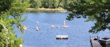 Paddle boards playing in the bay.  Note the swim platform for all to use!