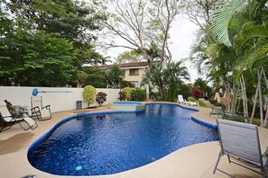 Pool area in front of this condo