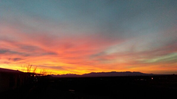 view of sunset from back porch