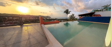 Enjoy our Roof top Infinity Pool for all our guests at Villa los Corales