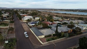 Cross Roads Traveller`s Rest Retreat with city & bridges across the Spencer Gulf