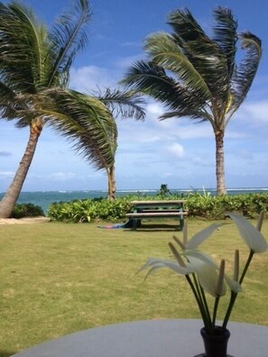 sitting on lanai facing the beautiful beach