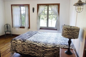 Upstairs Bedroom #3:
Equipped with a queen bed and amazing views of Lake Simcoe!