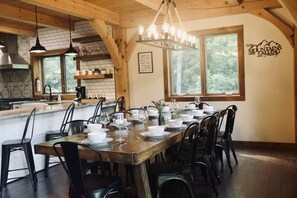 Large dining room table with seating and place settings for 10!