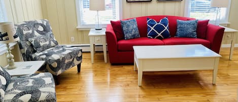 Living room with sofa/pull out sleeper w tempurpedic foam mattress