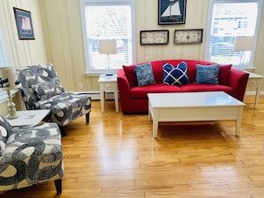 Living room with sofa/pull out sleeper w tempurpedic foam mattress