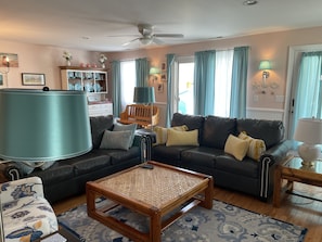 Spacious living room. We installed the sconces for enhanced evening ambiance.