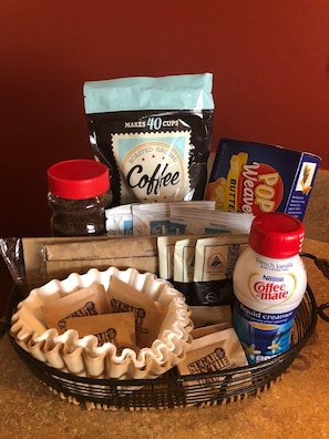 Your Welcome basket awaits. Coffee, hot chocolate, tea, bottled water, & snacks.