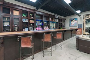 Separate bar and game room included. Please, BYOB!