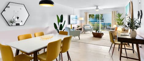 Bright and fun dining and living area.
Need to set up a laptop to 'work' from home, you can do that too.