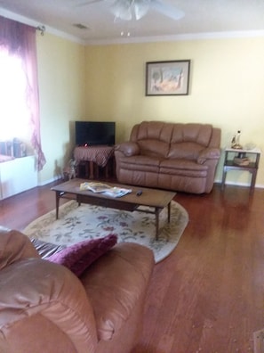 living room area two couches and chair