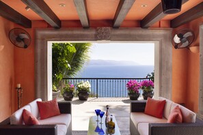 Poolside terrace, bar, grill & lounge gives families space in & out of the sun