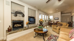 Large Great Room With Flat Screen TV And Gas Fireplace