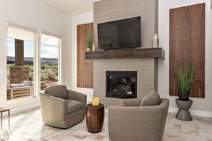 Front Room Fireplace - Stay cozy next to the fireplace.