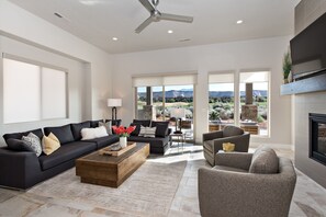 Side View of Living Room - The Living Room is conveniently located adjacent to the Kitchen and Dining Table and is a great place for entertaining guests during downtime.