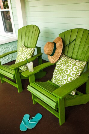 Kick back & enjoy a cold drink on the Adirondack chairs on the front porch.