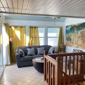 newly furnished living room effective March 2023