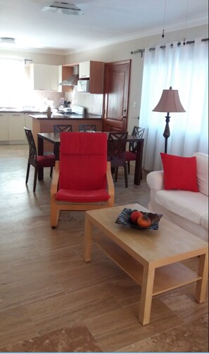 View from living room, dining room to kitchen