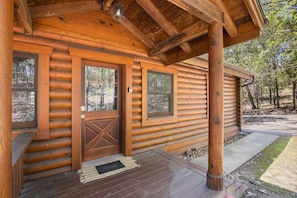 This Branson Woods cabin features authentic log construction.