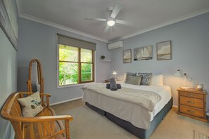 Master bedroom with king coil comfort.