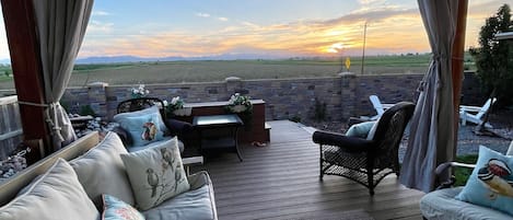 Our backyard shared Deck for you to enjoy the sunset or sunrise.