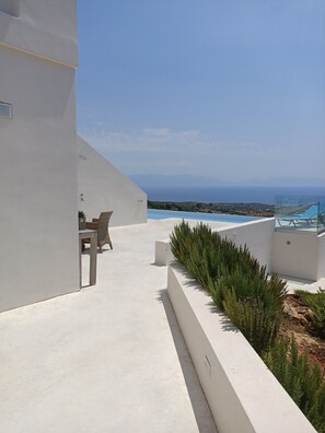 view of the pool and the sea in the area of the swimming pool