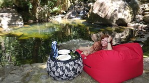 Relaxing by the swimming pool at Daintree Secrets