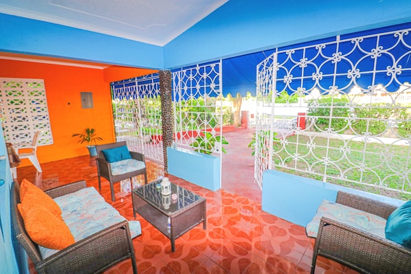 Relax on our beautifully vibrant veranda.