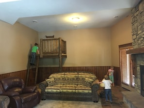 Family room with loft play area.