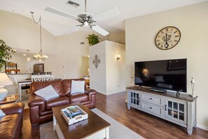 Spacious Living Room with TV