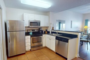 Nicely furnished with new flooring throughout, granite countertops, and stainless appliances