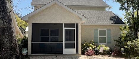 Front of cottage with the new screen porch.