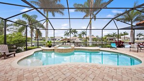 Heated pool and spa by gulf access canal