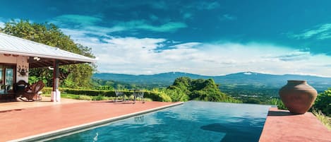 infinite solar heated pool with view of St Jose and 4 volcanos