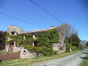 Front of house with road at side