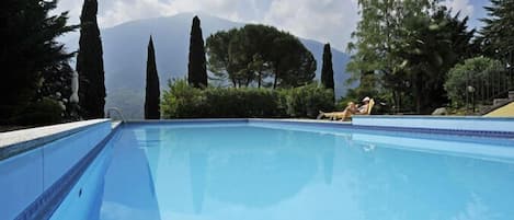 Communal pool with mountain views