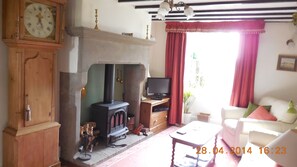 Lounge. FreeSat TV, local  clock. Feature fireplace, log burner, logsprovided.