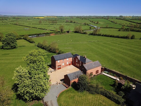 Surrounded by fields and canal