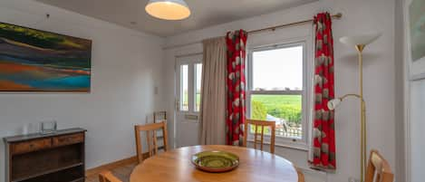 Dutch oak dining table with views over the fields