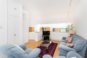 The split-level entirely open downstairs adds to the light and airy vibe