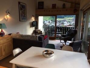 Living & Dining Area with views across Morzine to Pleney Mountain