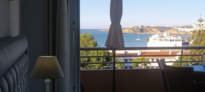Both sets of doors leading to patio open fully.  Close enough to hear the Waves!