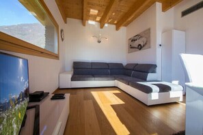 Living room with open plan kitchen