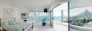 Main bedroom & Jacuzzi deck. The tv has been updated & there is a couch to relax