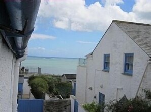 View along cottage to sea