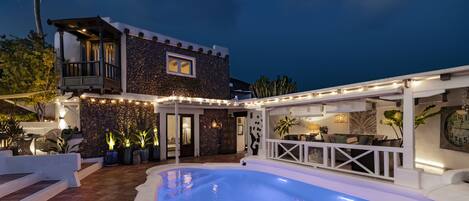 Main villa, alfresco “Palm” lounge, and floodlit pool, with dinning area terrace