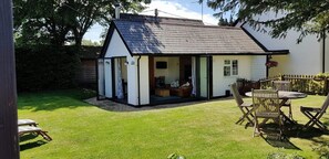 The bifold doors onto the garden make for a lovely space for entertaining.