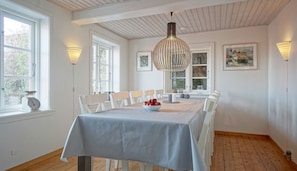 Dining area with space for 10 persons - extra chairs can be added at the end
