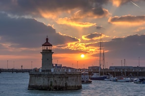 the lighthouse in the harbour, 10 mins walk