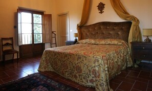 The bedroom in the tower of the villa